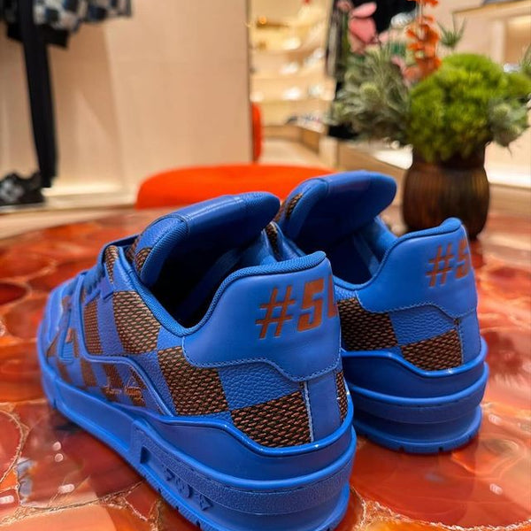 The fist LV Trainer Sneaker designed by Pharell Williams